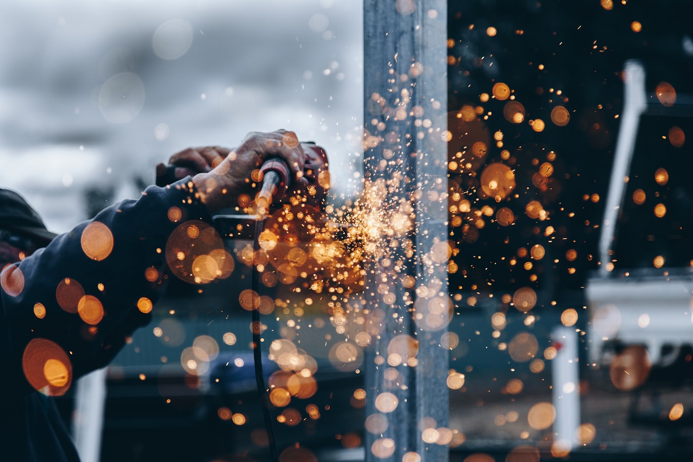 Sparks from grinding metal on a production line